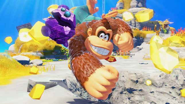 Donkey Kong punches his way towards the screen.