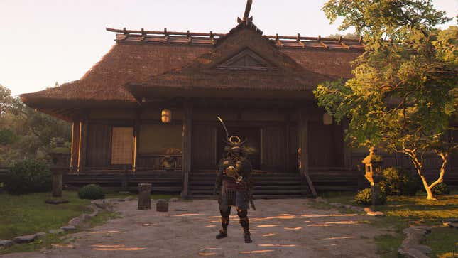 Yasuke standing before the main hideout entrance in Assassin’s Creed Shadows.