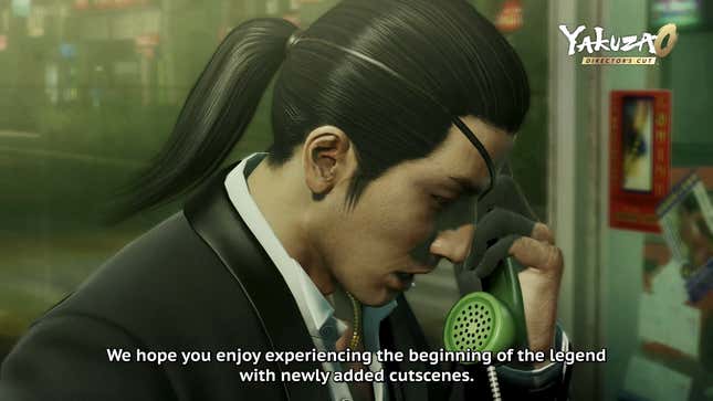 A Yakuza chats to someone on the phone while subtitles reveal that the game has new cutscenes.